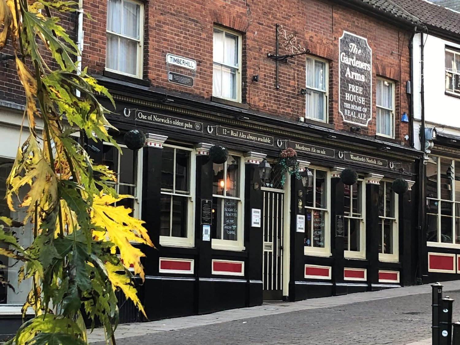 The Gardeners Arms on Timberhill in Norwich, the pub everyone calls the Murderers, its black and cream frontage advertising twelve real ales